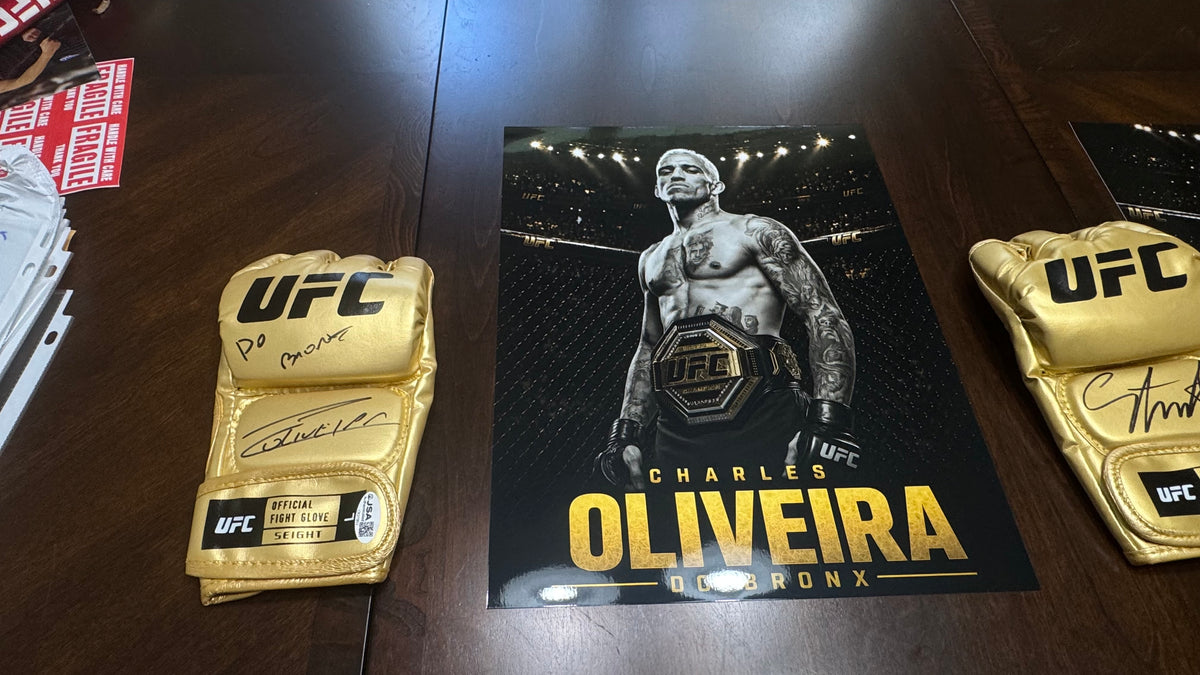 Actual Charles Oliveira signed gold UFC glove displayed beside custom Do Bronx championship artwork.