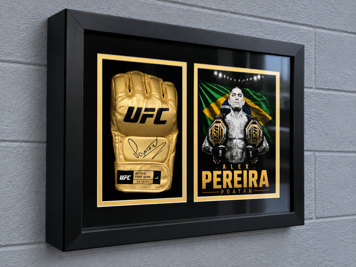 Alex Pereira signed gold UFC glove Gallery Gold display mounted on a grey wall, shown from an angled side view.