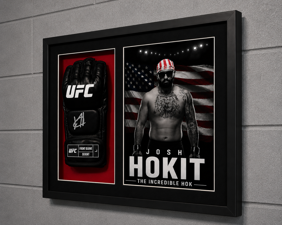 Josh Hokit framed sports memorabilia display mounted on a gray wall. The black shadowbox frame contains a black UFC glove on a red insert next to a black-and-white Josh Hocket promotional poster with an American flag background.