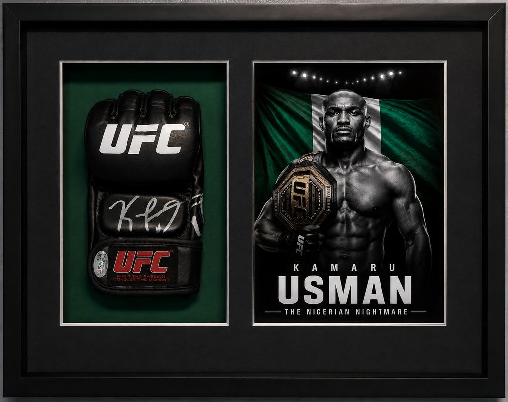 A framed UFC memorabilia display featuring a black autographed UFC glove on the left and a black-and-green poster of Kamar Usman on the right, both mounted inside a black frame.