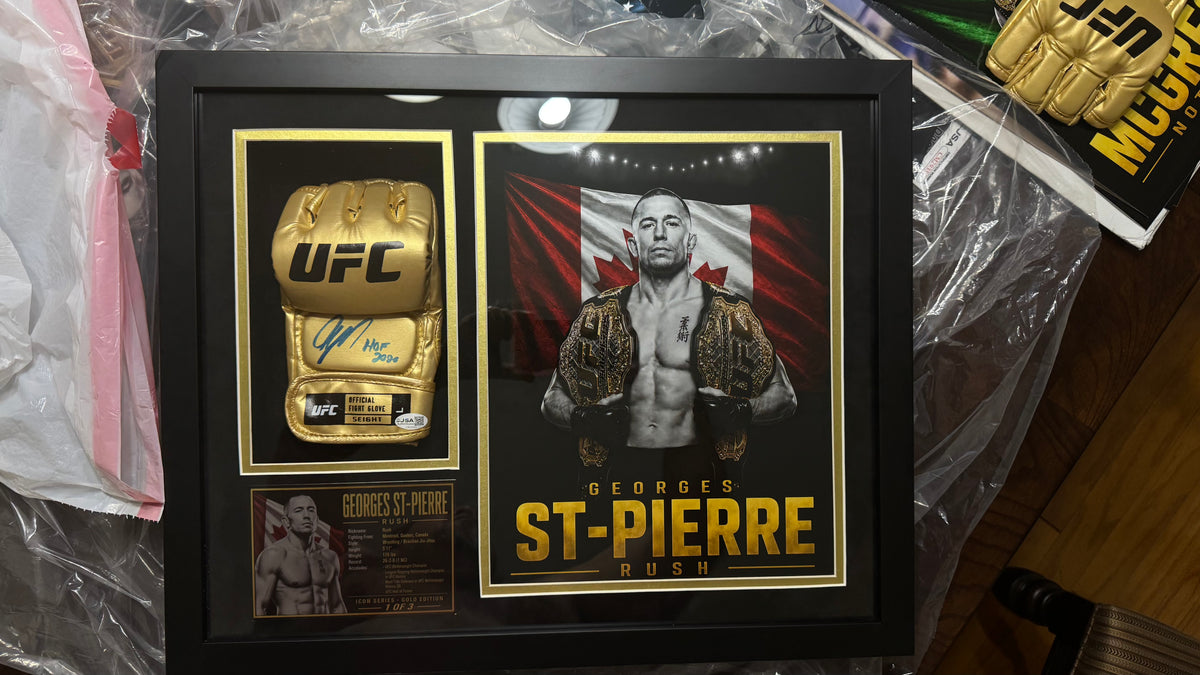 Georges St-Pierre “Rush” Signed UFC Glove — Icon Gold Series 1 of 3