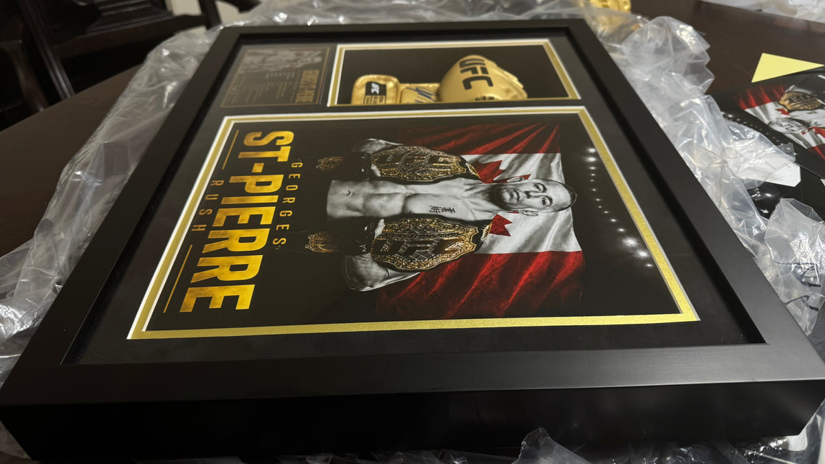 Georges St-Pierre “Rush” Signed UFC Glove — Icon Gold Series 1 of 3