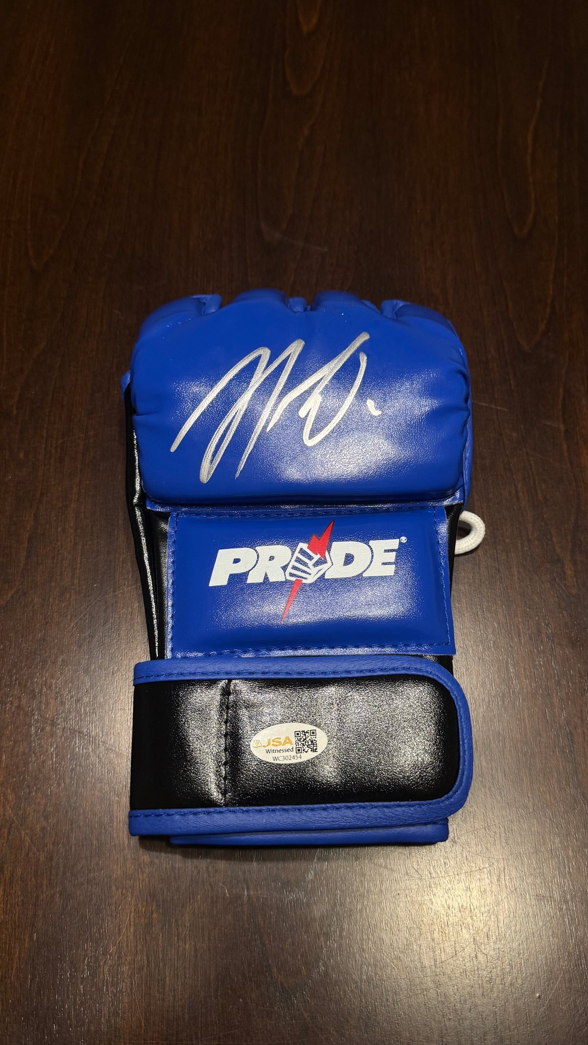 Nick Diaz signed blue PRIDE MMA glove with silver autograph, JSA witnessed