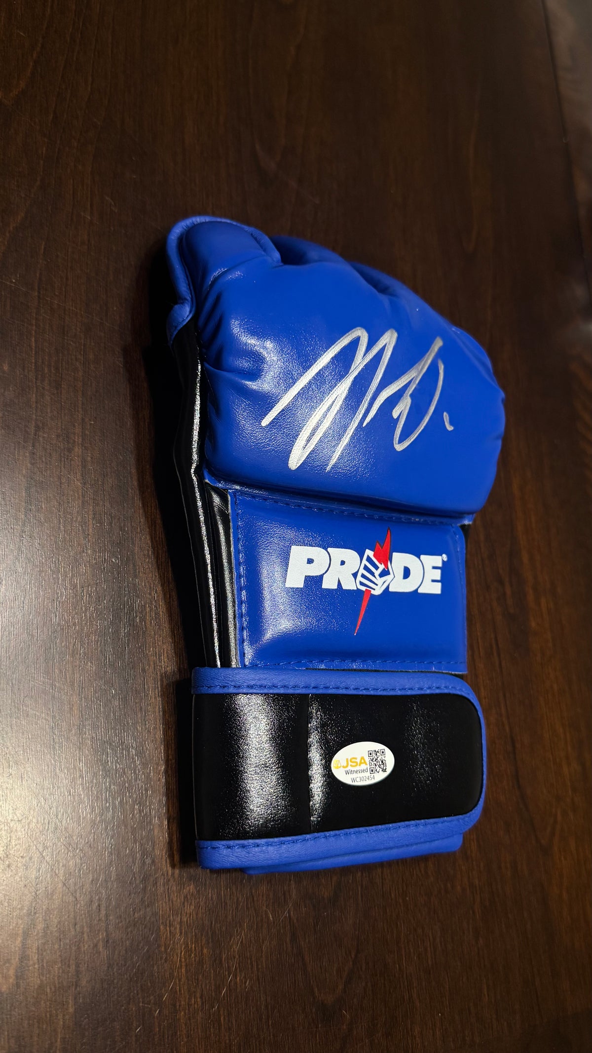 Nick Diaz autographed blue PRIDE FC MMA glove with JSA Witnessed authentication
