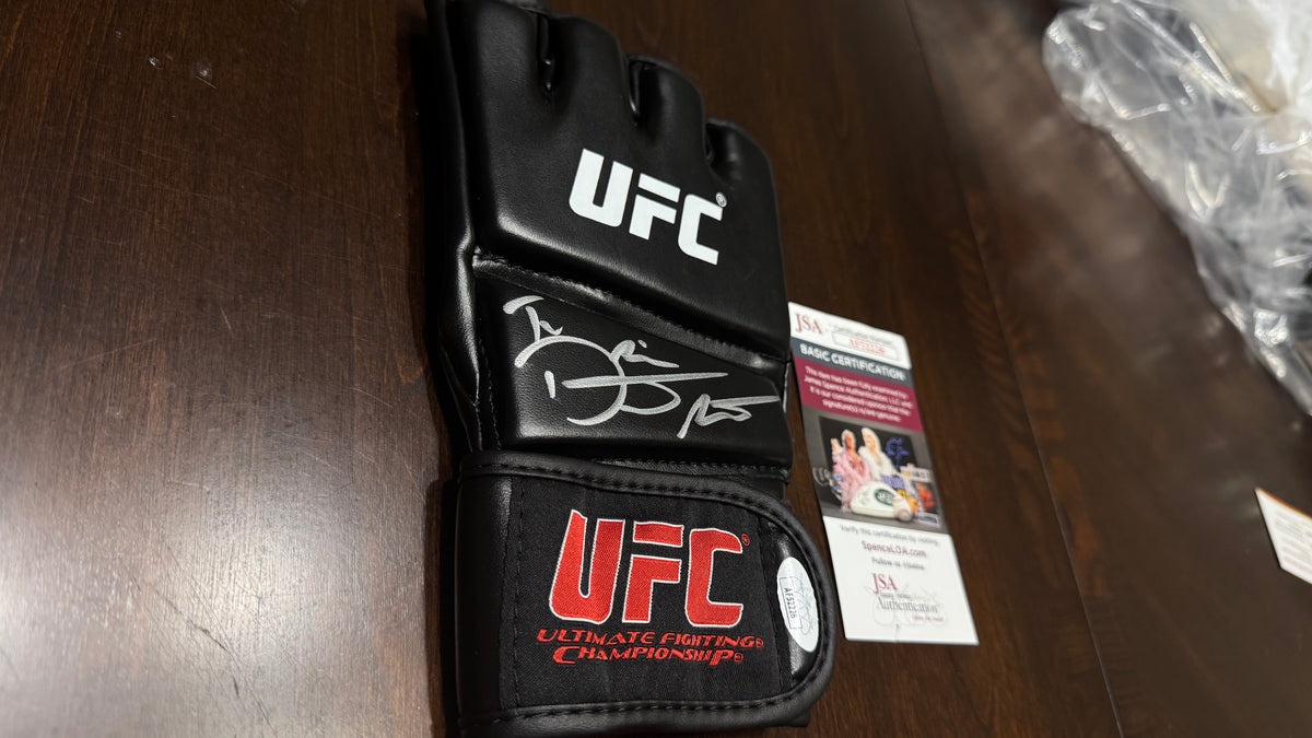 Dustin Poirier signed black UFC MMA glove with silver autograph, JSA authenticated