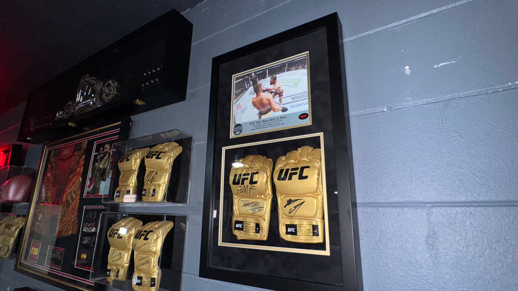 Jorge Masvidal & Nate Diaz Signed Gold UFC Gloves – UFC 244 BMF Event-Used Octagon Canvas Museum Display