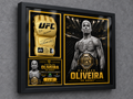 Left-angle view of the Charles Oliveira Champion Gold Series custom shadow box with black framing and gold accent matting.