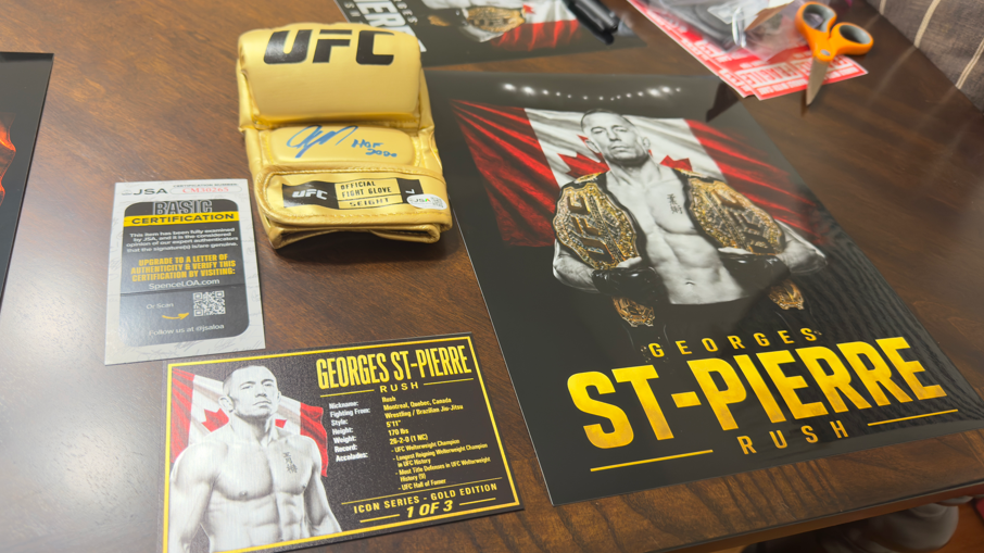 Georges St-Pierre “Rush” Signed UFC Glove — Icon Gold Series 1 of 3